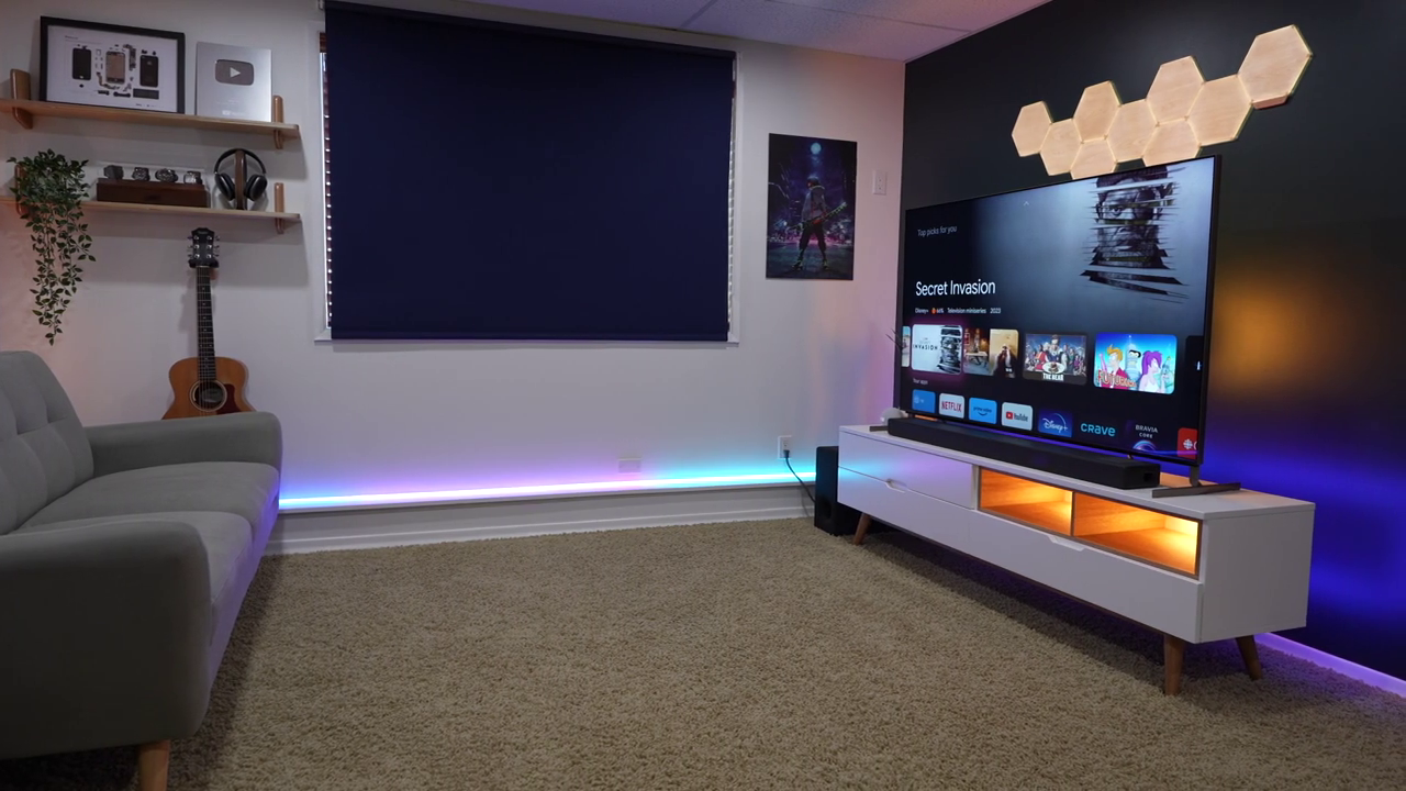 Entertainment room with Nanoleaf panels and TV setup