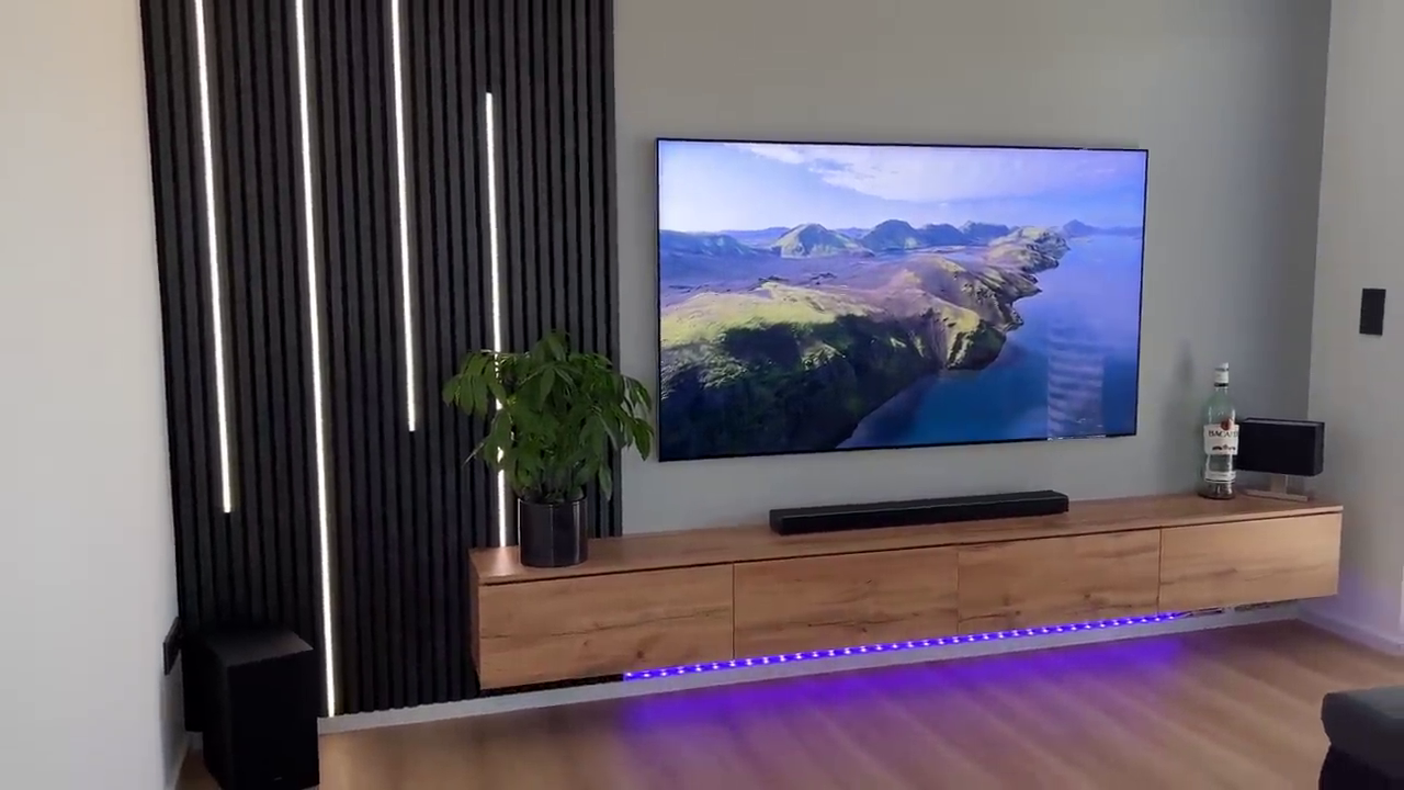 TV media unit with vertical LED accent strips